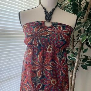 Sleeveless blouse with necktie with beaded front